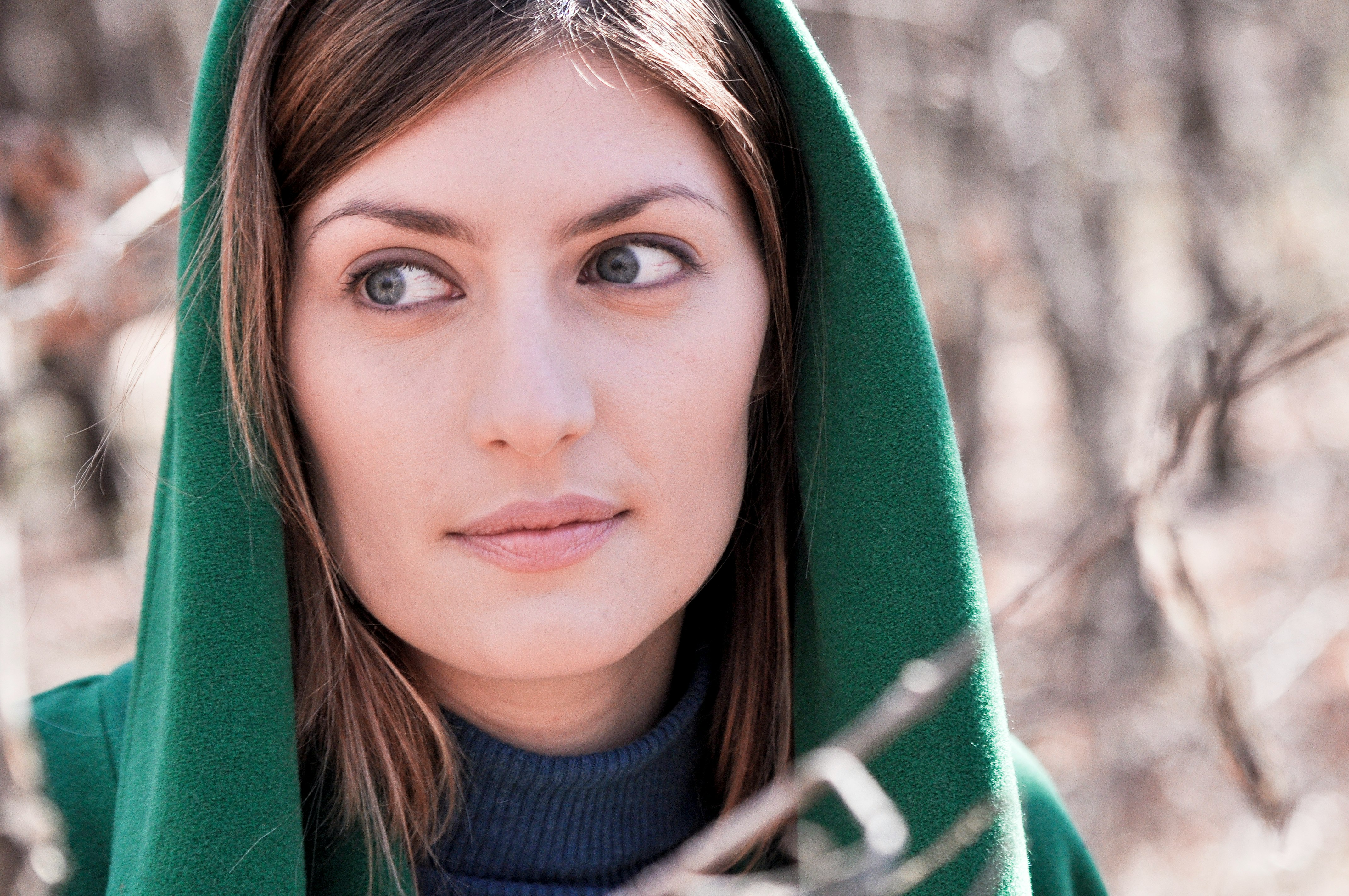 woman wearing blue turtleneck top